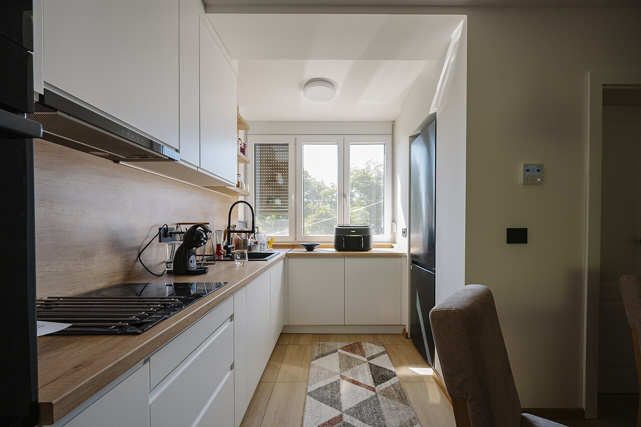 Spotless modern kitchen with daylight from a window